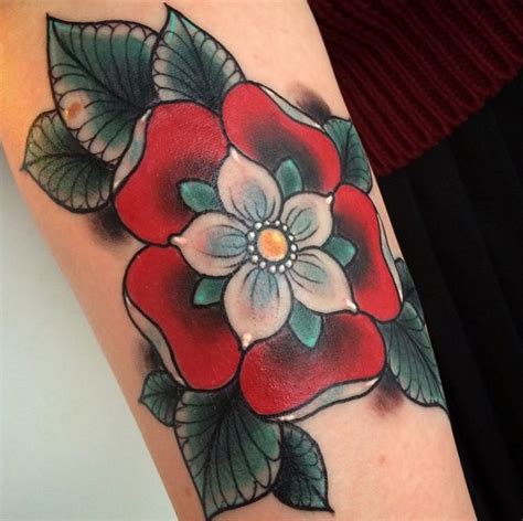 tudor rose sleeve tattoo